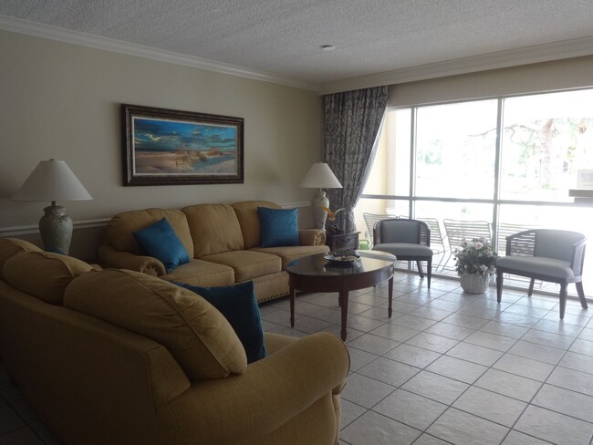 Building Photo - Annual Rental! 1BR/1BA 55+ Condo on the Is...