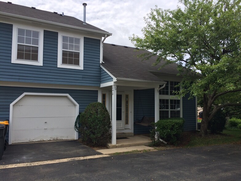 exterior with 1 car garage and 2 parking spac - 240 Acorn Dr