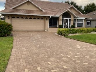 Front showing paved driveway - 6050 Westbourgh Dr