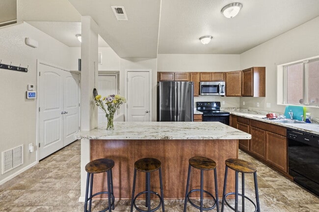 Building Photo - "Beautiful Townhome 3-Bedroom  2.5 Baths no carpet home, just 7 minutes from Fort Carson!"
