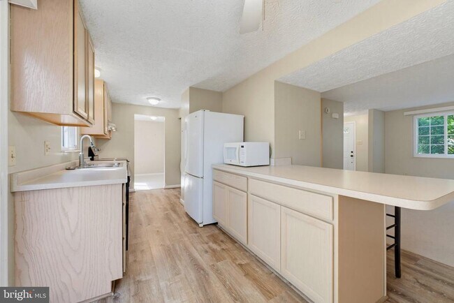 Building Photo - 8467 Magic Tree Ct