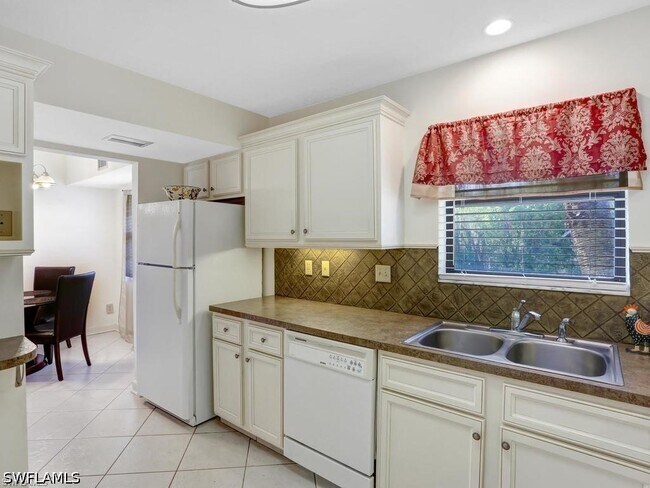 Building Photo - 4912 Tamiami Trl E