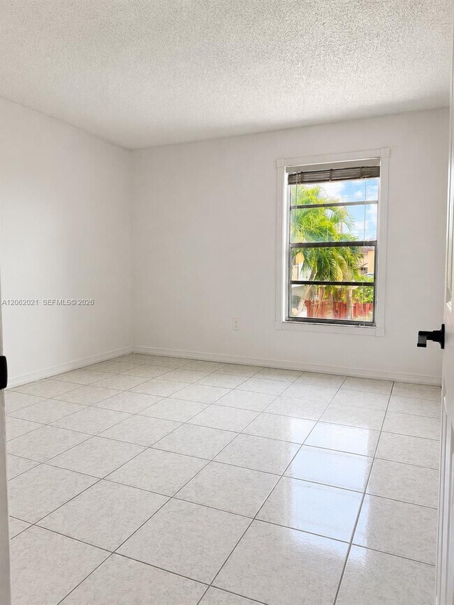 Building Photo - 6095 W 18th Ave