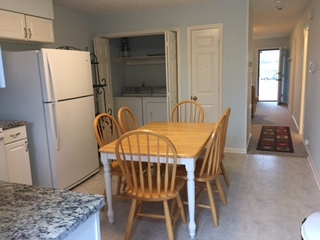 Kitchen with washer/dryer closet - 4790 Trousdale Dr