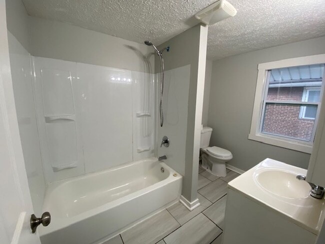 Building Photo - Updated 5-Bed, 2-Bath with Attic Suite & Clean Basement