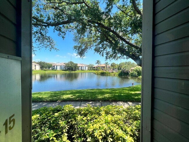 Building Photo - ? Charming 1/1 Condo in Resort-Style Community with Pool & Gym