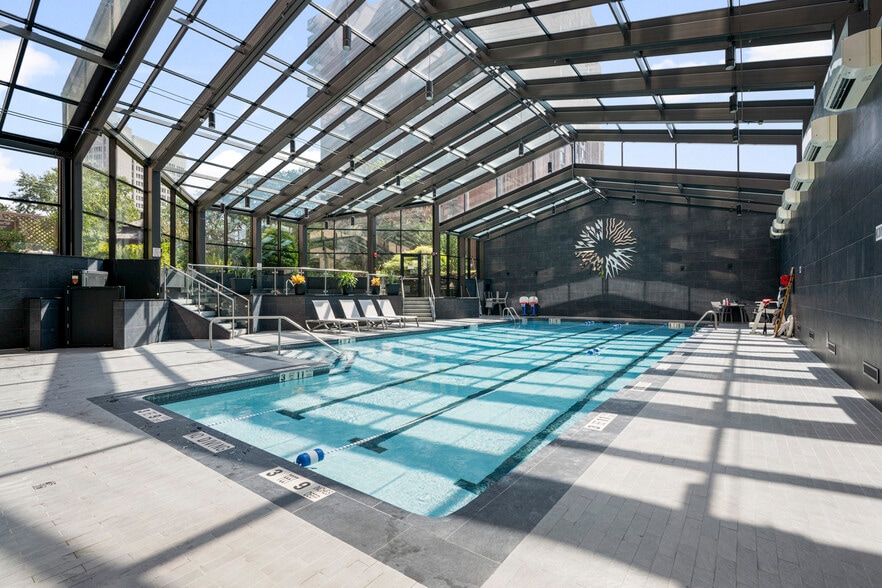 Indoor pool and spa connects to steam, sauna, fitness space and locker rooms. - 4 Martine Ave