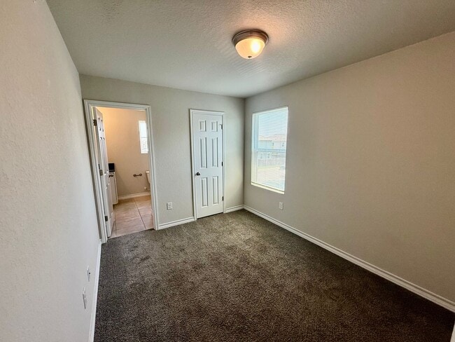 Building Photo - 8331 Breezy Cv