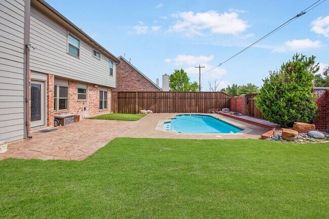 Building Photo - 8204 Tavaros Dr