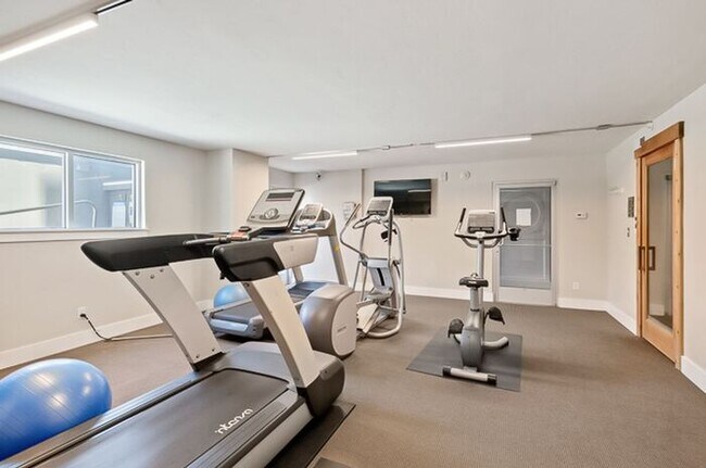 Building Photo - 2BR Condo w/ Covered Parking and Balcony Views at Broadway Towers