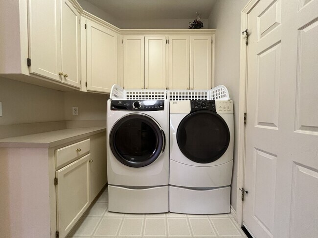 Building Photo - Executive-Style Northwest Heights Home with Forest Views and Refined Architectural Details