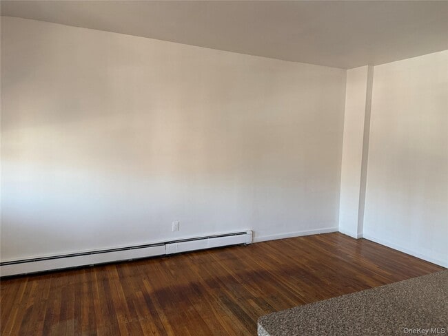 Building Photo - 69-35 De Costa Ave