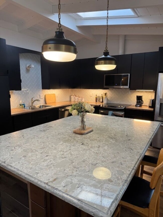 Building Photo - Beautifully Furnished and Recently Painted, Corner Lot Home Features a Fenced Backyard with an In...