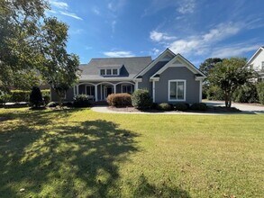 Building Photo - Welcome to Elegant Living in the Charming ...