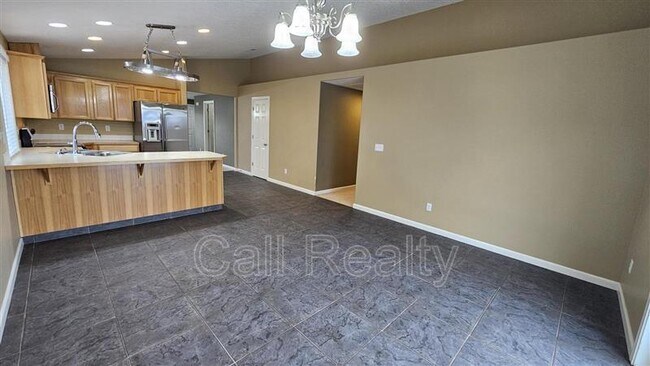 Building Photo - 9302 W Caelen Ave