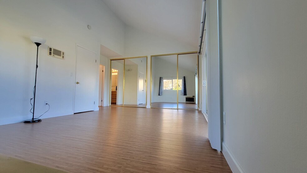Master bedroom has 14ft tall vaulted ceiling, en suite bathroom, separate His and Hers closet. - 9505 Easter Way