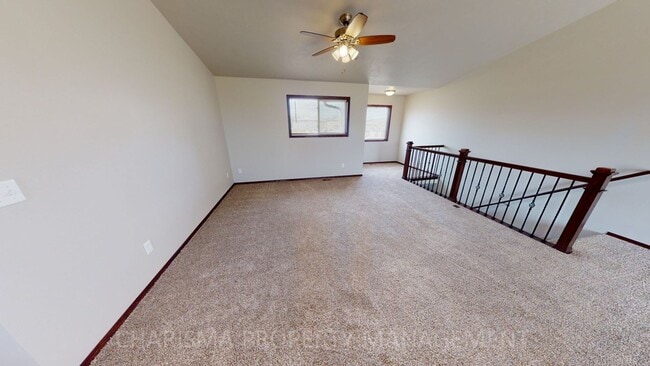 Building Photo - 3 BEDROOM, 2 BATH TOWN HOME, INDIVIDUAL ENTRANCE, DOUBLE ATTACHED GARAGE, PET FRIENDLY, NEWER DEV...