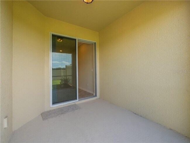Patio with Sliding Door, extra space, Nice spacious back side private space. - 1074 Amber Leaf Trail