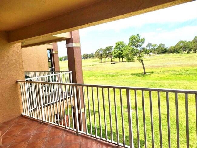 Building Photo - 13827 Fairway Island Dr