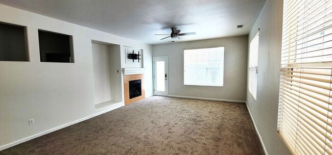 Building Photo - Single-Story 3 Bed, 2 Bath Home in Gated Double Diamond Community – Pool, Gym & 2-Car Garage