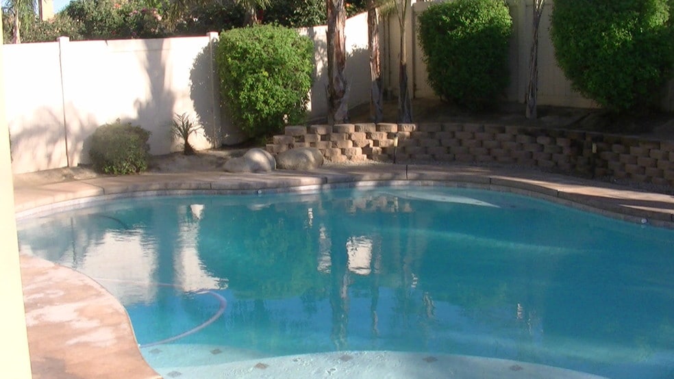 Yard with pool - 9810 Grey Goose St