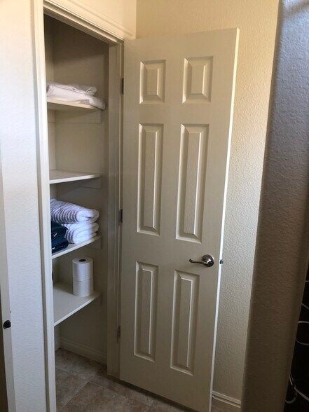 Bath linen closet - 1806 N Dixie Downs Rd