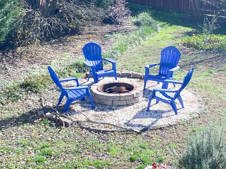 Enjoy quiet time around the fire pit. - 11423 Five Cedars Rd