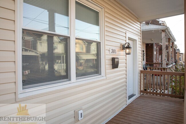 Building Photo - Updated 4BR House with 2 full baths and yard!