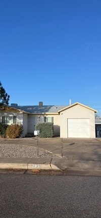 Building Photo - Nice 3 Bedroom 2 Bathroom, 2 Living areas. NE Heights, with plenty of room to roam inside and out