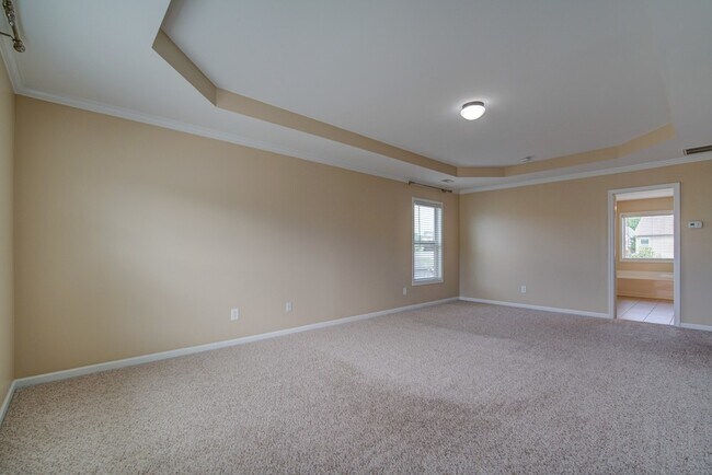 Building Photo - Gorgeous 4/5 BR, 3 BA, 2 Car Garage Home with Fenced Backyard and Large Storage Unit