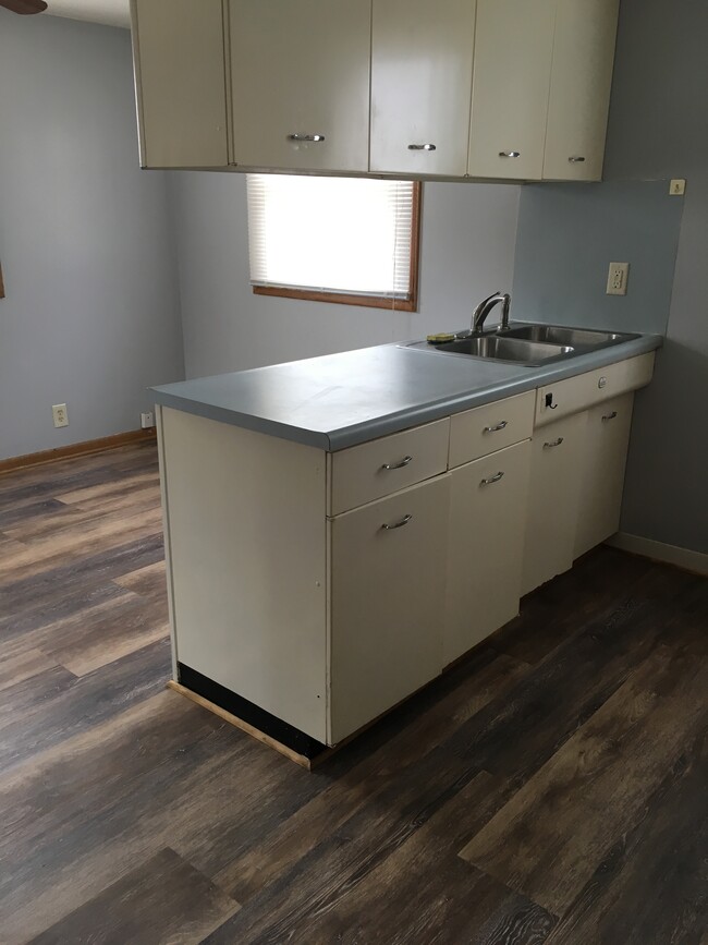 Kitchen open to dinning and living space. - 1106 Tudor St