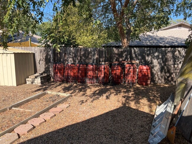 Building Photo - Four bedroom two bathroom home with a pool in Central Davis