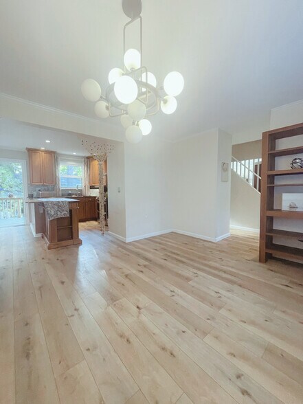 Open concept dining and eat-in kitchen - 10 Lundy Ln