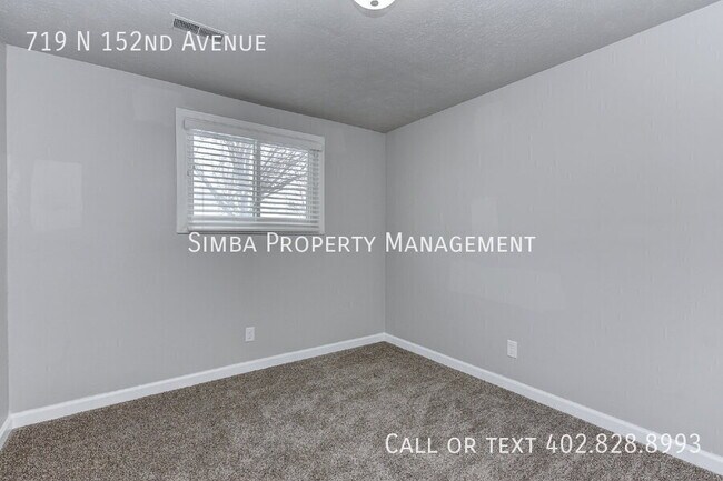Building Photo - 719 N 152nd Ave