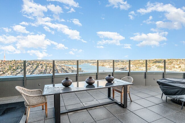 Building Photo - Urban Oasis at Spire Condominiums – Modern...