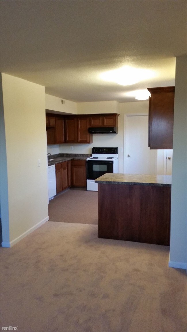 Building Photo - 2 br, 1 bath Apartment - G.T. Woods Proper...