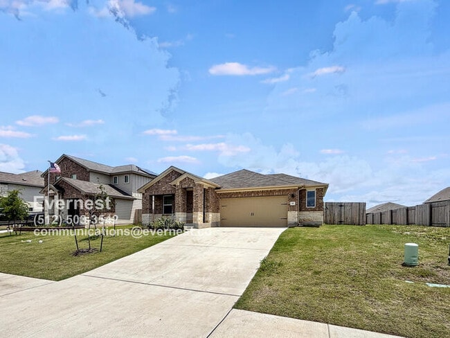 Primary Photo - Spacious 4-Bedroom Home with Modern Comfor...