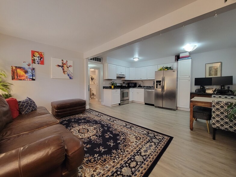 Before the remodel to see the space furnished - 3663 S Sheridan Blvd