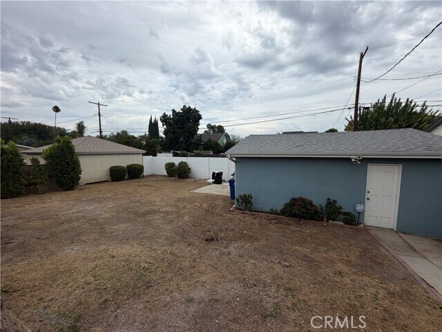 Building Photo - 6934 Woodlake Ave