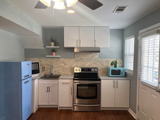 There are all new appliances in this open layout kitchen. - 7837 Heaton Way