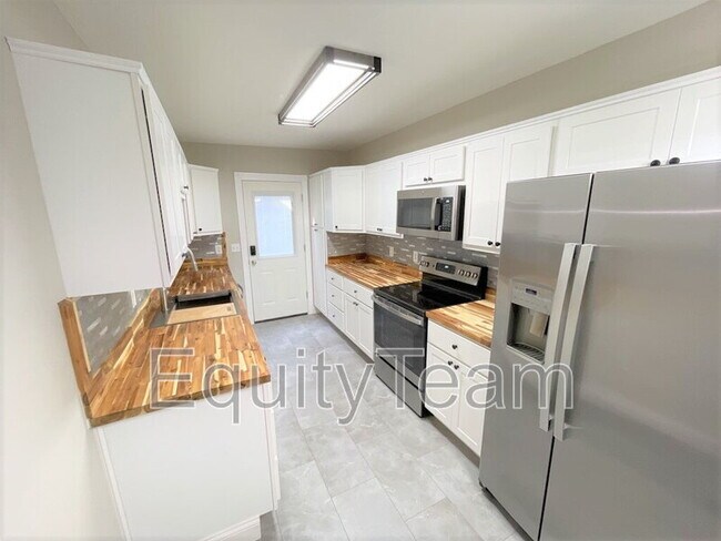 Building Photo - 4723 Peabody Ave