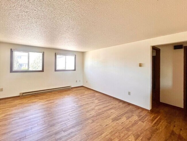 Building Photo - TWO WEEKS FREE RENT - Water/Sewer/Trash Included - Large Two Bedroom One Bath In North Loveland! ...
