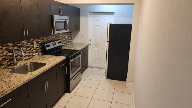 Building Photo - 1210 NW 30th Ave