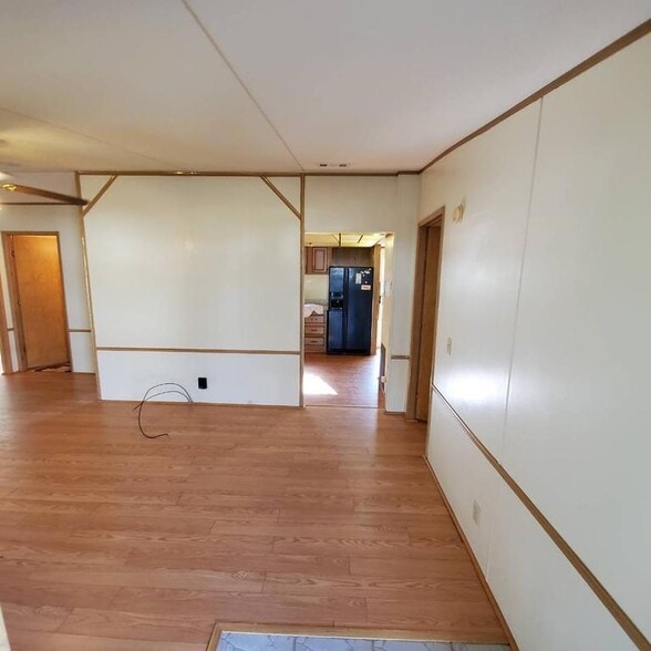 LIVING ROOM LOOKING TOWARD KITCHEN - 15017 Johansson Ave