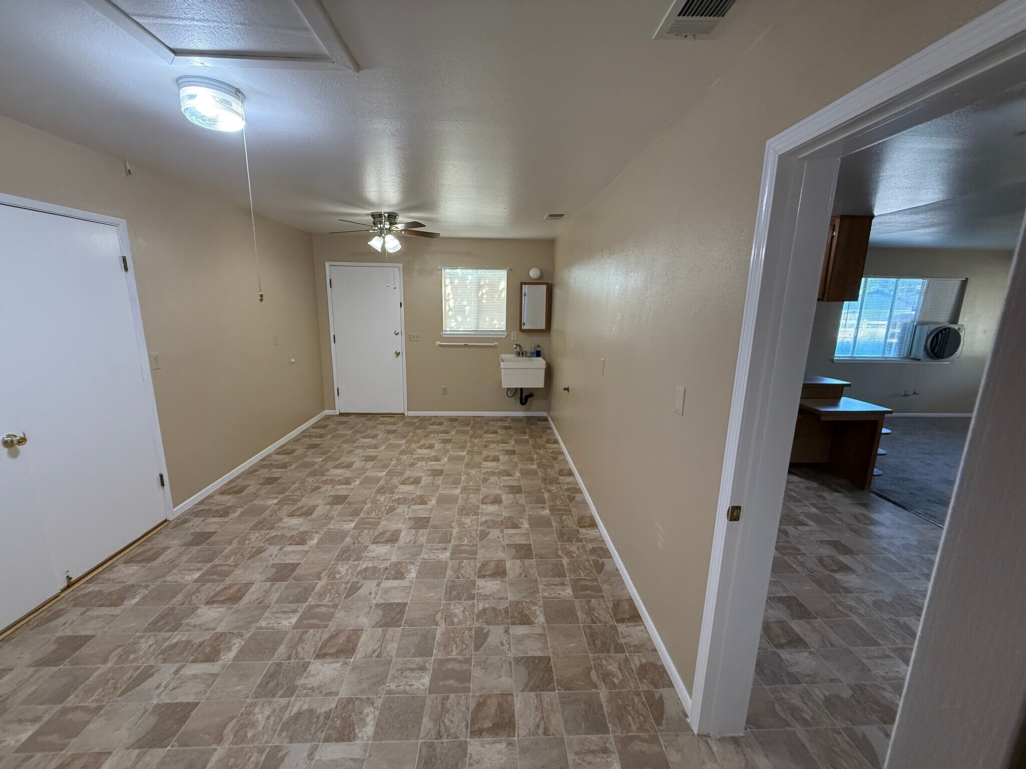 Bonus room, leads out to attached garage - 15936 Lime St