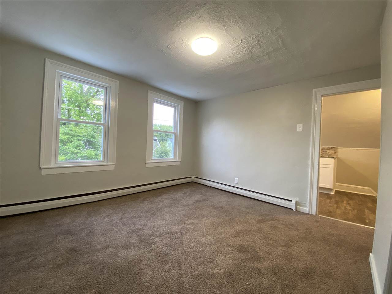 Living room with large storage closet - 315 Naymut St