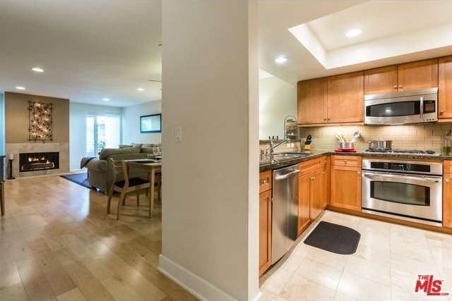 Kitchen and living room/dining room area view - 1951 N Beachwood Dr