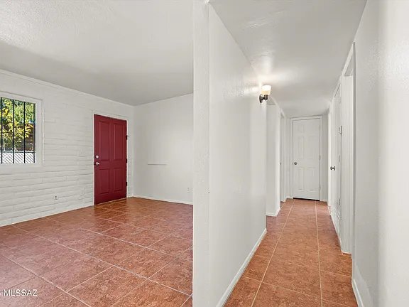Building Photo - 1408-1410 N Hualpai Rd