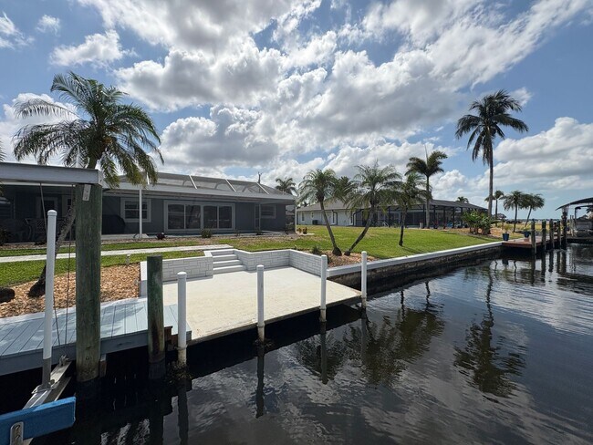 Building Photo - Beautifully Furnished Pool Home with Boat ...