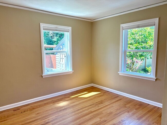 Building Photo - Spacious Montavilla Home on Corner Lot with Hardwoods, A/C, 1 Car Detached Garage, Finished Attic...